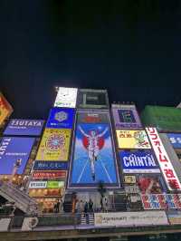Dotonbori Street with neon light and food 