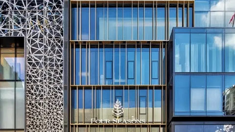 The Four Seasons Hotel Montreal blends French elegance with the modern simplicity of the city skyline — traveler post in Quebec Province