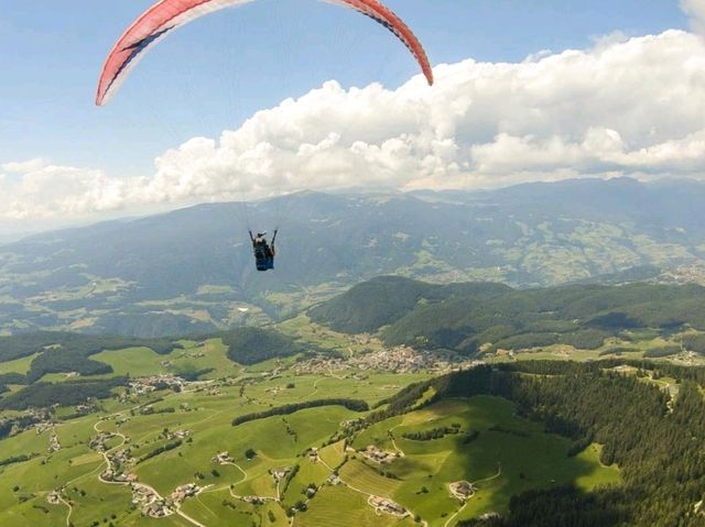 Enjoy the thrilling paragliding experience at the Dolomites!