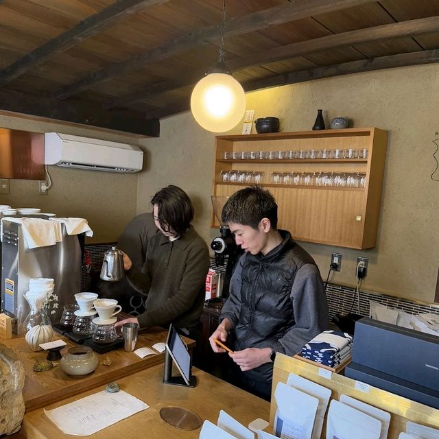 a nice little cafe by a parking lot