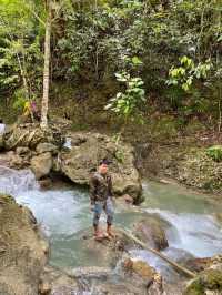 A Picturesque Two Tiered Waterfall located in the Lush of Hill in Alegria