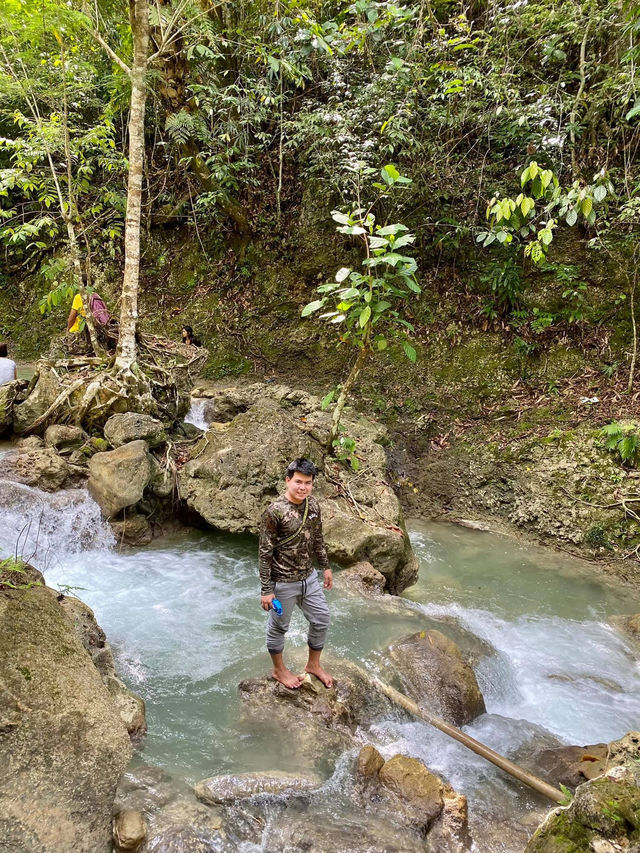 A Picturesque Two Tiered Waterfall located in the Lush of Hill in Alegria