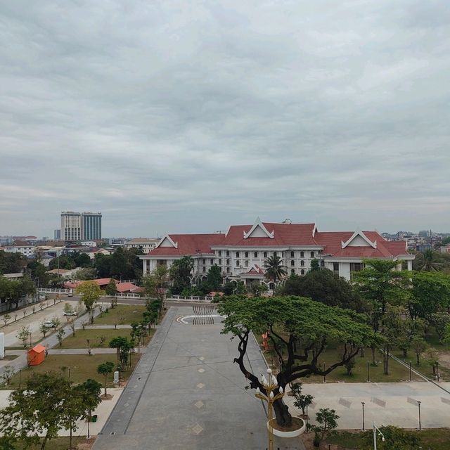 Ascending to Elegance: Patuxay's Embrace Above Vientiane