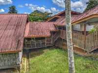 “Echoes of Tradition: Embrace the Longhouse Legacy at Sabah Tea Resort”