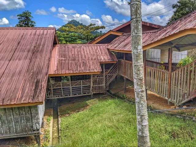 “Echoes of Tradition: Embrace the Longhouse Legacy at Sabah Tea Resort”