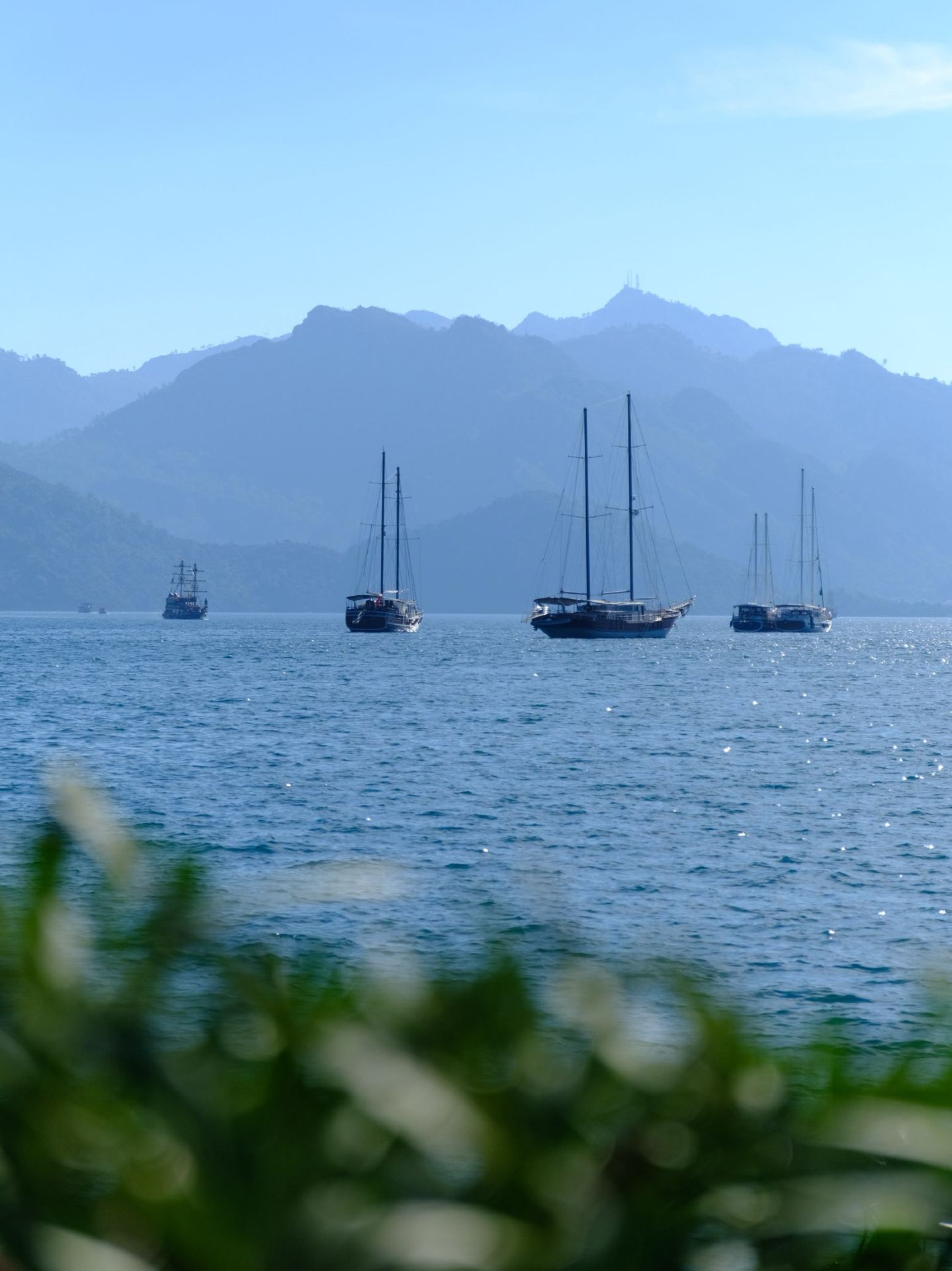 🏖️ Marmaris: Where the Aegean Sea Meets the Mediterranean

How to get there: The nearest airport is Dalaman (approximately 100 km). From there, you can take the Havaş shuttle or book a private transfer to Marmaris—the journey takes about 1.5 hours.

Where to stay (briefly by neighborhood):
· İçmeler: Ideal for families and divers, clear water, but a bit far from the center.
· Armutalan: Budget-friendly, lots of entertainment, and close to the Camiavlu Waterfall.
· Turunç: A quiet and relaxing getaway in a picturesque bay.

What to see in the city:
· The Fortress and Old Town: Marmaris's calling card. The fortress houses a history museum, and the narrow streets with colorful shutters are a delight to wander through.
· Netsel Marina and Promenade: a 12-kilometer promenade for strolling and the largest marina in Turkey.
· Ancient Amphitheater: built in the 4th–5th centuries BC, now used for concerts.

Best Beaches and Bays:
· İçmeler: the most convenient and popular beach near the city.
· Turunç: crystal-clear water and a tranquil atmosphere.
· Cleopatra Beach (Sedir Island): a legendary spot with azure waters, where, according to legend, Mark Antony brought sand from Egypt. • Kızkumu: an unusual sandbar extending into the sea – a perfect location for beautiful photos.

Things to do besides the beach:
· A boat cruise through the bays of Marmaris will take you to the most transparent places inaccessible by land.
· A jeep safari along the Bozburun Peninsula or a pirate ship ride for families with children.
· Bar Street: the center of nightlife for those looking for a fun time.
· Shopping at the Grand Bazaar: spices, sweets, textiles, and ceramics.

Marmaris is a great base for day trips. You can also visit Rhodes in Greece or Dalyan for the mud baths and Iztuzu Beach.