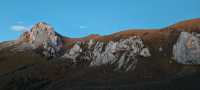 不去這山就去納山