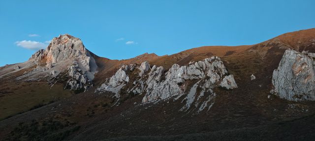 不去這山就去納山