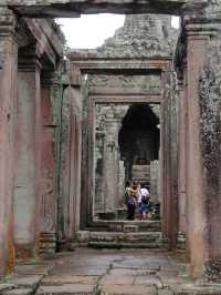 Whispers of Stone: A Morning at Bayon Temple