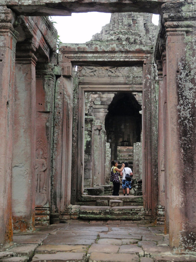 Whispers of Stone: A Morning at Bayon Temple