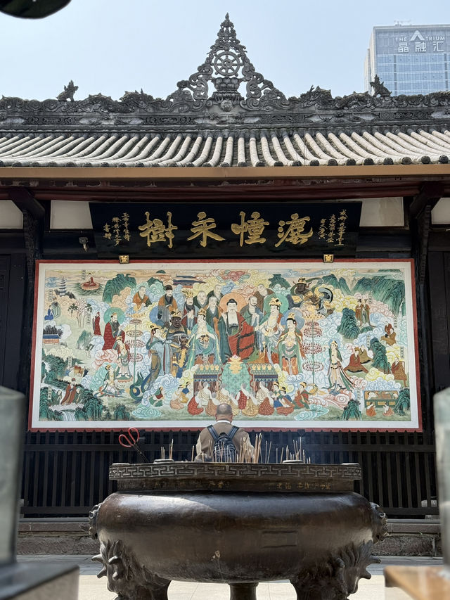 Serene temple next to busy Taikoo Li