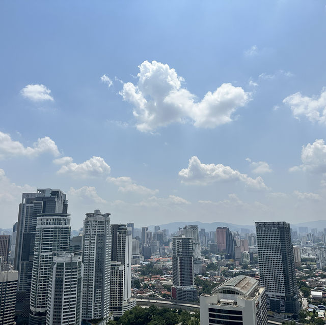 Envi Skydining with the Skyline of KLCC