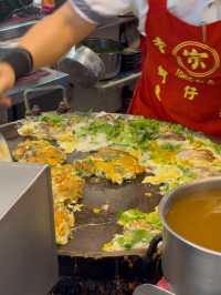 Oyster Egg Omelette on Conveyor Belt: Michelin Dish at Ningxia Night Market