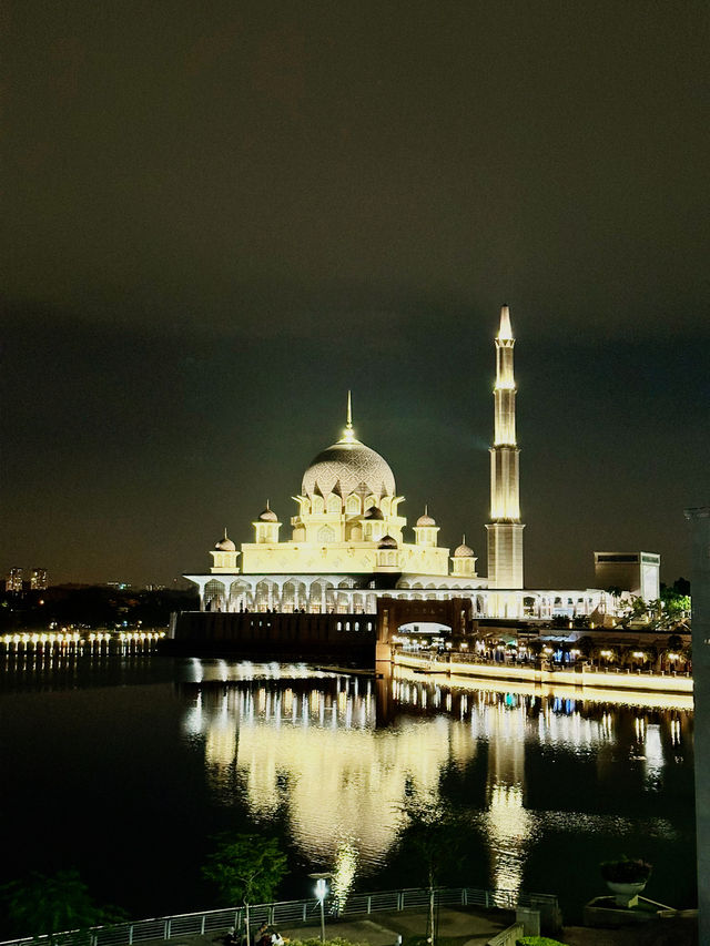 Flags, Lights & Midnight Calm – Putra Square at Night