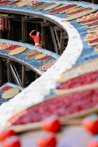 Autumn Sun-drying at Chuxi Tulou | Winnowing baskets are not props, they are part of Hakka daily life