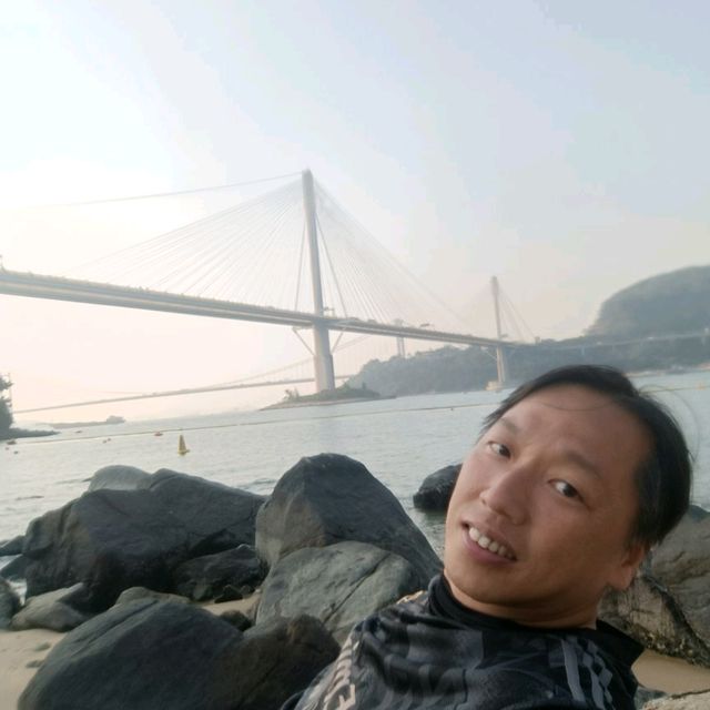黃昏日落下的汀九橋