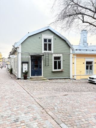 Step into the charm of Porvoo, one of Finland's oldest towns, and enjoy a relaxing walk through history and architecture. Begin your day exploring the heart of Old Porvoo, renowned for its quaint cobblestone streets and colorful wooden houses. Take time to admire the mixture of modern and Western-style facades, especially on a cloudy and rainy day, where the softer lighting brings out the town’s peaceful mood.

A must-visit stop is Porvoo Museum, located at Jokikatu 45. Housed in the Old Town Hall, this museum captures the essence of Porvoo’s cultural heritage and showcases both the building’s classic architecture and interior design. The Town Hall itself is a beautiful example of Western-style architecture, and you can wander through its rooms steeped in history. This attraction is open Wednesday to Sunday from 12:00 to 16:00, making it perfect for a midday stroll—especially if you’re looking to shelter from unpredictable rain showers.

Walking through town, you’ll find close-up views of well-preserved outdoor cultural landscapes, including stone buildings and streets lined with other trees typical of the area. For those interested in architecture, keep an eye out for modern additions alongside centuries-old structures. Many of these buildings, whether viewed outside or inside, present perfect opportunities for photography, especially when lighting shifts between cloudy, rainy, and sunny spells.

If you happen to visit Porvoo Cathedral, step inside and enjoy its peaceful interior—a prime spot to take a moment for yourself and soak in the local atmosphere. The church is both a spiritual and architectural highlight, inviting visitors to appreciate its close-up details and grand Western-style design.

Tips for your walking tour:
- Dress in layers and bring an umbrella, as Porvoo’s weather can switch quickly from cloudy and rainy to sunny.
- The museum opens in the early afternoon, so plan your route to start with the church or town’s outdoor scenes in the morning and visit the museum after noon.
- Comfortable walking shoes are a must for cobblestone streets.
- Consider spending time in local cafés for classic Finnish pastries and a chance to chat with locals.

Porvoo’s walkable old town and blend of architectural styles deliver a memorable escape, whether you’re a culture enthusiast or just seeking a tranquil day trip.

#Porvoo #FinlandTravel #Architecture #CulturalHeritage #WalkingTour