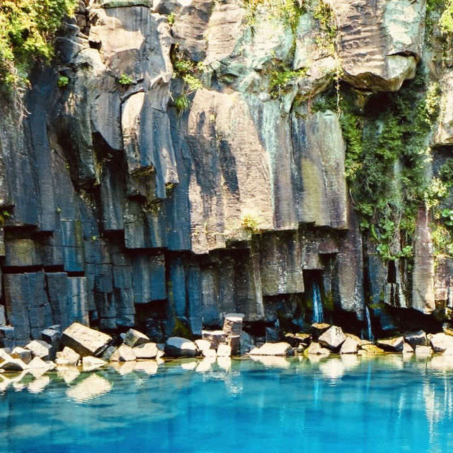 🌿💦 *Cheonjeyeonpokpo Falls (천제연폭포): Jeju’s “Pond of the Gods”* 🌈✨