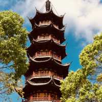 Longhua Temple: Shanghai’s Oldest & Most Majestic Buddhist Sanctuary** 🌸🏯