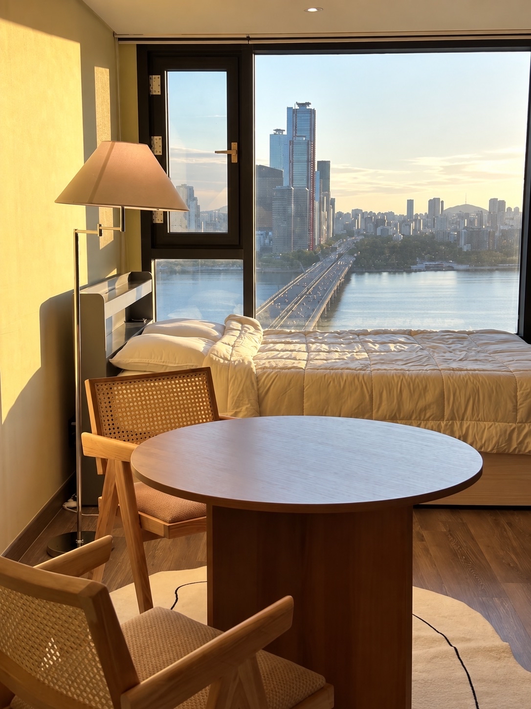Seoul Accomodation Find 🇰🇷 Han River Views + Hongdae Plans

That window view deserves a moment 🤎 Imagine slow mornings by the river, an afternoon exploring Hongdae, and coming back to golden light falling across your bed.

This stay caught my eye for its warm wooden furniture, cosy dining corner and Han River views.

Details:
📍 By Mapo Station, Exit 1
🛏️ For 2 guests, with 1 bed and 1 bathroom
🍳 Kitchenette for simple meals
🧺 Washing machine for longer trips
🛁 Bathtub for a little downtime
🚇 5 minutes to Hongdae by subway.

Save this for your Seoul accommodation shortlist ✨

#seoulstay #hanriverview #hongdae #seoultravel #koreatravel #seoul #hongdae #seoulhotel #visitseoul #hotel 