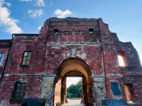 #winterescape Step into History at Brest Fortress 🇧🇾🚩  
Get ready for an evocative journey through one of Belarus’s most iconic WWII landmarks. Under drifting clouds and sunshine, the striking architecture and solemn outdoor grounds of Brest Fortress set an unforgettable scene for history buffs and curious wanderers alike.

🗺️ Start your day early—for calmer crowds and that golden sunlight glinting off the fortress buildings. Enter through the impressive Soviet star-shaped gateway, then follow the well-marked path through the vast grounds. Pause at the main Courage Monument for that dramatic, insta-worthy shot: capture the towering concrete head framed by sky, with the fortress arches just behind.

🎖️ Must-sees include the Kholm Gate with its bullet-scarred façade, the eternal flame, and the hauntingly beautiful sculptures scattered throughout the memorial park. Don’t miss the on-site Museum of Defense for deeper context (some English signage, but the atmosphere transcends language).

📸 Best photo spots:  
- Courage Monument at sunrise or sunset for epic light  
- Reflections in the surrounding moat, especially when clouds sweep by  
- The massive “Thirst” sculpture for an intense close-up  

🔍 Personal Tips: The grounds are mostly open-air, so dress for the weather—sunny days mean gorgeous light, but bring water and a sun hat, as shade is limited. If you want peaceful pics, aim for the edges of visiting hours (after 8 AM or before closing at midnight). Sturdy shoes are a must for all the walking.  

⚠️ Key Precautions: Some paths are uneven, and indoor areas may have limited English explanations—download a translation app or grab a local guide if you’re keen on the stories.

#Brest #BrestFortress #BelarusTravel #WarHistory #CulturalHeritage