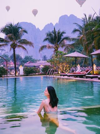 Laos travel 🇱🇦 Watch hot air balloons from the hotel‼️ Average cost per person is 300.