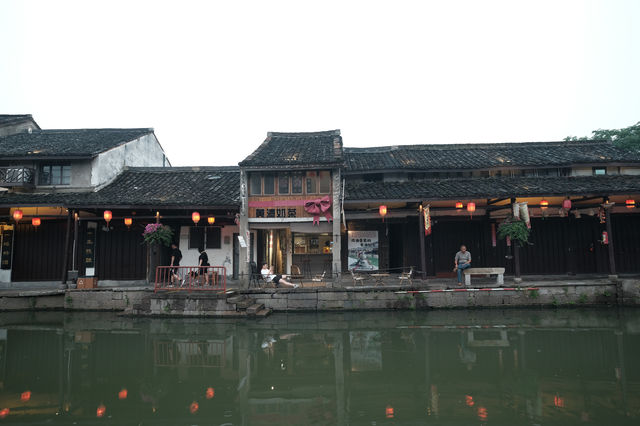 煙雨洗青簷，初夏邂南潯