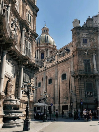 Ready for a European city-hopping adventure? ✈️ This guide covers the vibrant capital of Sicily, Palermo, its metro neighbor Catania, and the dynamic energy of Madrid! Prepare for UNESCO sites, mouthwatering street food, and must-snap photo stops. 🚀

Top Spots to Visit & Eat:

1. Palermo
· Palermo Cathedral (Via Vittorio Emanuele, 490): Get there early (7AM-7PM) and climb to the roof for a panoramic shot you’ll want to frame.
· Quattro Canti (Piazza Villena): Also known as “Teatro del Sole,” this baroque crossroads is Palermo’s Insta-icon—visit day or night!
· Teatro Massimo (P.za Giuseppe Verdi, 90138): Swing by between 9:30AM-7PM for guided tours or catch a performance. The architecture is next-level.
· Walk Palermo’s historic core on foot—get lost and soak up the layered history.

2. Markets & Street Food
· Mercato Ballarò: The soul of Palermo! Don’t miss arancini, polpo bollito (boiled octopus), and other Sicilian specialties. Go with an empty stomach.
· Catania: For next-level arancini, stop at Arancini Espressi (Via Landolina N 46). Crispy, gooey goodness you’ll crave after you leave.

Insider Tips:
· Palermo: Early mornings = fewer crowds and softer light for photos at Quattro Canti or the cathedral roof.
· Carry cash for markets; not every stall takes cards.
· Most attractions walkable in Palermo—comfy shoes are a must.

Getting Around:
All cities have easy public transit and taxis, but Palermo’s core is best explored on foot!

Must-Try Food: Arancini, polpo, and anything fried at Ballarò. Grab a gelato for your stroll.

#SicilyEats  #PalermoVibes  #EuropeTrip  #StreetFoodHunt 