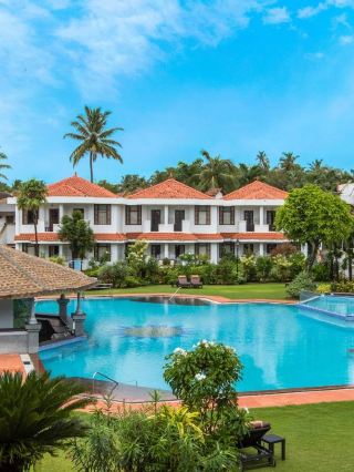 🌴✨ Goa's Finest: Heritage Village Resort & Spa 🏖️🌟