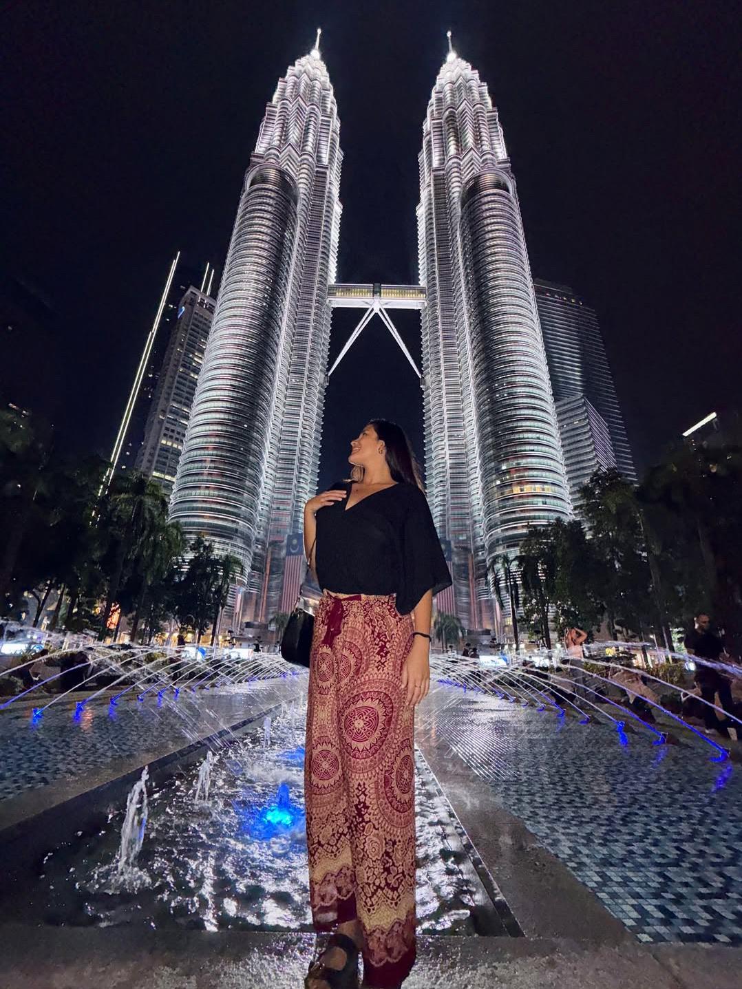 My holiday to the Petronas Twin Towers in Kuala Lumpur was truly unforgettable. Standing at 452 meters tall, the towers are an architectural marvel and a must-see in Malaysia. I visited the Skybridge on the 41st floor and the observation deck on the 86th floor, both offering breathtaking views of the city skyline. At night, the towers light up beautifully, creating a magical atmosphere perfect for photos. The surrounding KLCC area is vibrant, with the Suria KLCC mall offering great shopping, dining, and even an aquarium. The nearby KLCC Park is ideal for a relaxing walk or a family picnic. Everything is well-organized and tourist-friendly. Whether you're into architecture, city views, or just soaking in a new culture, the Twin Towers offer it all. It was a perfect blend of modern beauty and Malaysian pride. I highly recommend it for anyone visiting Kuala Lumpur!