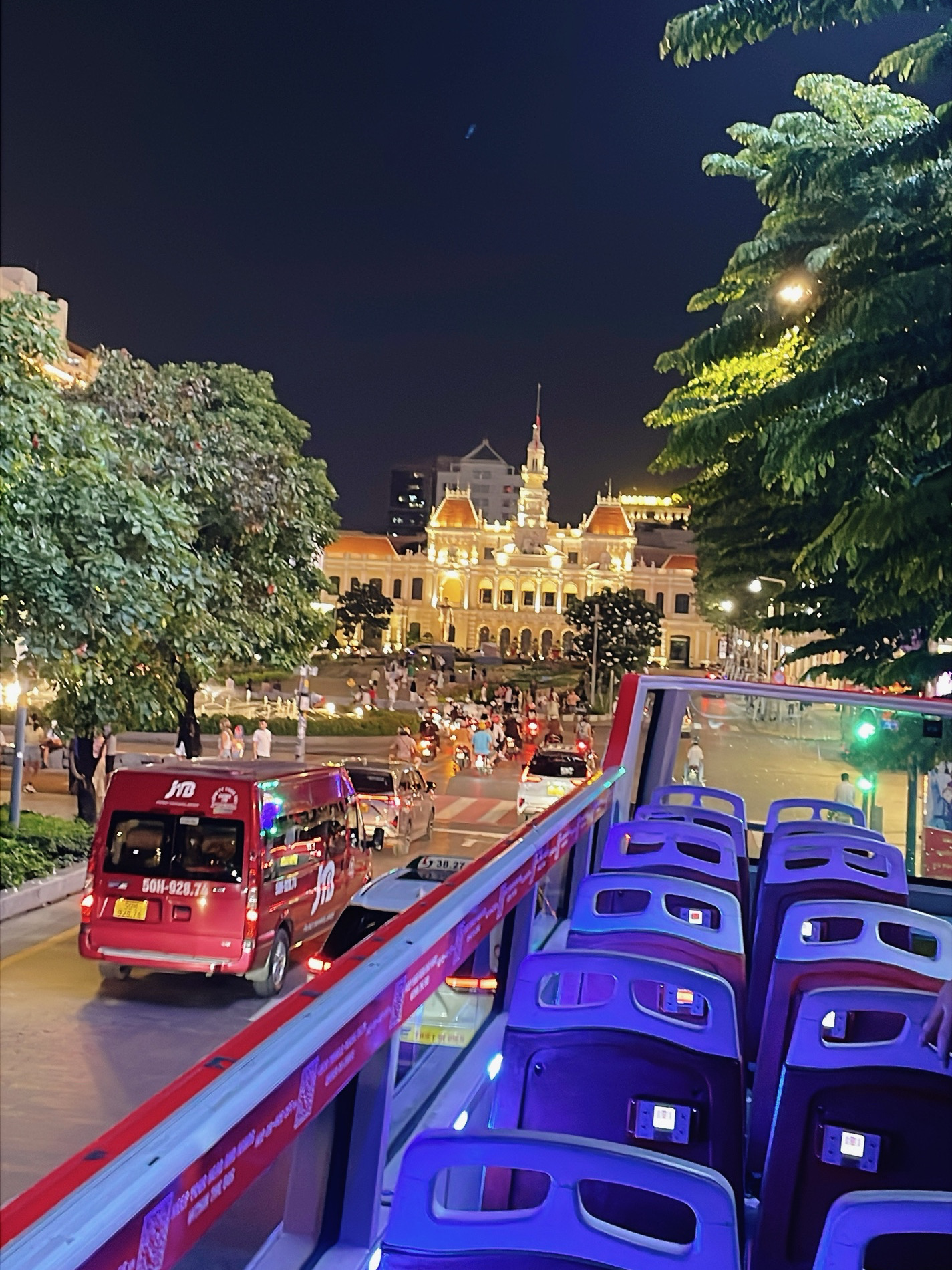 Take a ride on an open-top bus and explore Ho Chi Minh City 🇻🇳