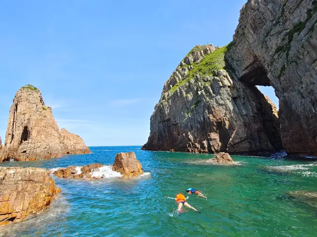 Hong Kong's hidden gem, Sharp Island, boasts a world-class sea cave and snorkeling in crystal clear waters.