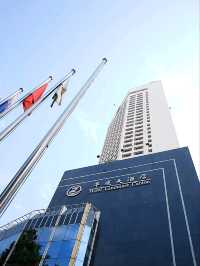 "Landmark Canton Hotel: Riverside Elegance in Guangzhou's Historic Heart"