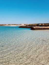 Jeju's Iconic White Sand and Emerald Waters with Island Views