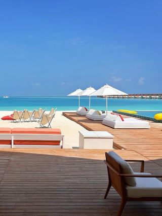 The Standard Huruvalhi Maldives Hotel - The vibrant and bright colors are perfect for a vacation with girlfriends or couples