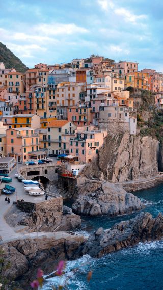 The Lonely Planet cover is a photo trick of Italy's Cinque Terre