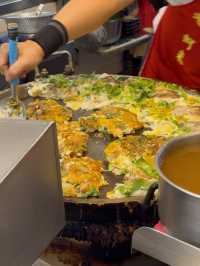 Oyster Egg Omelette on Conveyor Belt: Michelin Dish at Ningxia Night Market