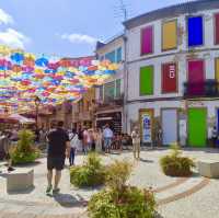 🌈 Umbrella Skies & Hidden Charms: A Colorful Day in Águeda