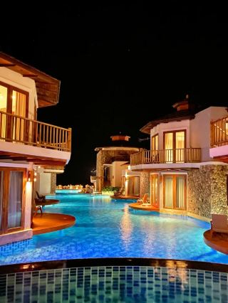 This Thai water resort is absolutely stunning! Step right into a massive pool from your door