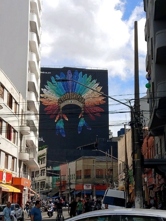 Colorfull huge street arts on the tall building 