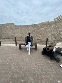 “Whispers of the Past: The Timeless Walls of Bahrain Fort”