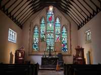 Bright stained glass and the beauty of the stone building