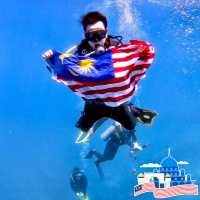 Celebrating Malaysia's National Day: A Journey Through the Pristine Waters of Sipadan