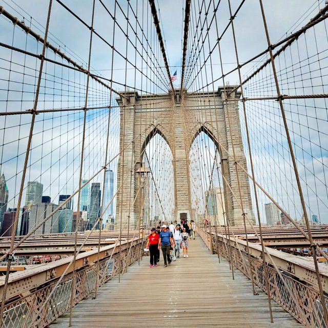 City Skyline Serenade: Brooklyn Bridge's Timeless Charm