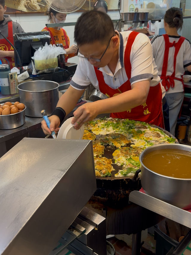 Oyster Egg Omelette on Conveyor Belt: Michelin Dish at Ningxia Night Market
