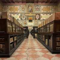 🏛️ *"A Scholar's Retreat: Time-Traveling Through Bologna's Archiginnasio"* ✒️📚
