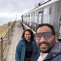 “A Rain-Kissed Adventure on the Snowdon Mountain Railway: Breathtaking Views and a Thrilling Journey