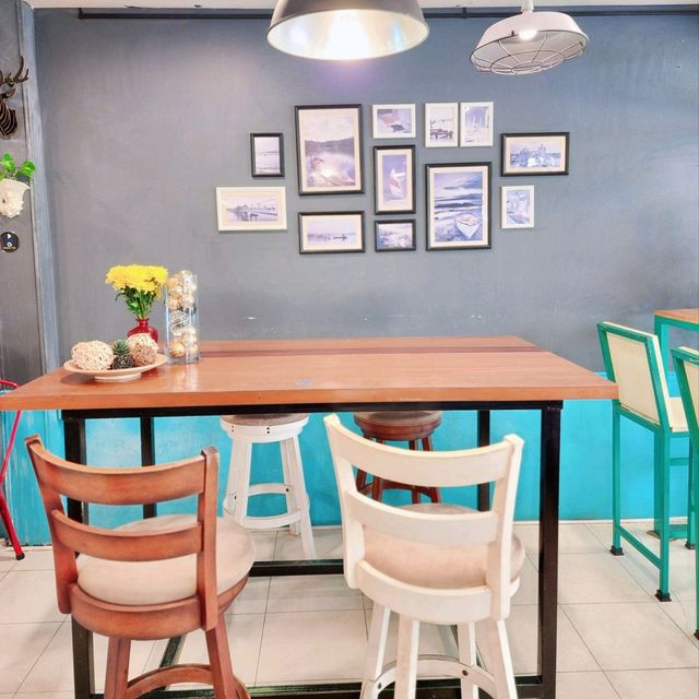 ร้านกาแฟริม​แม่น้ำบางปะกง
