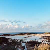 A Pristine Canvas of White Sand and Azure Waters