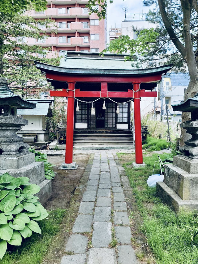 A serene and historic Shinto shrine located near Aomori Bay